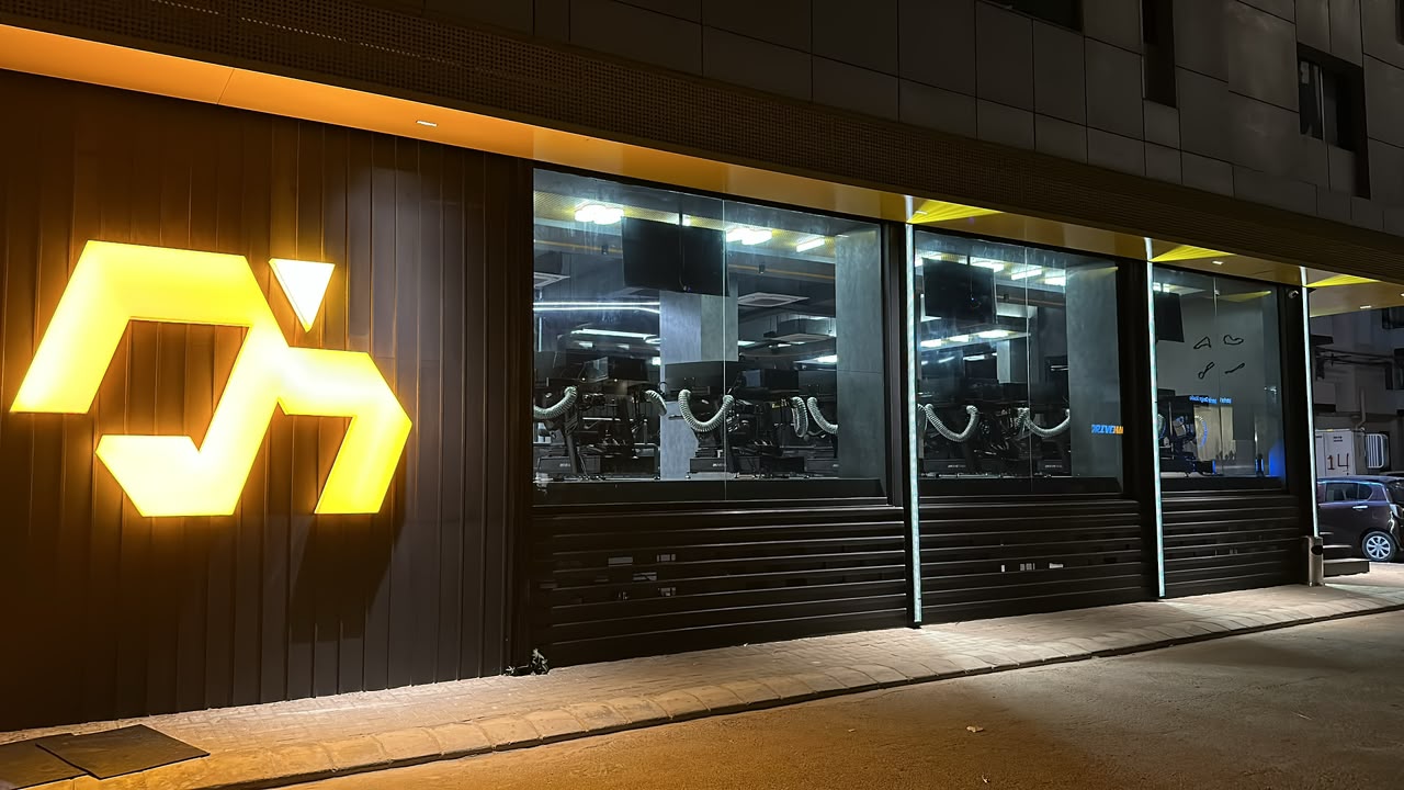 The Drivehaus sim racing venue at night