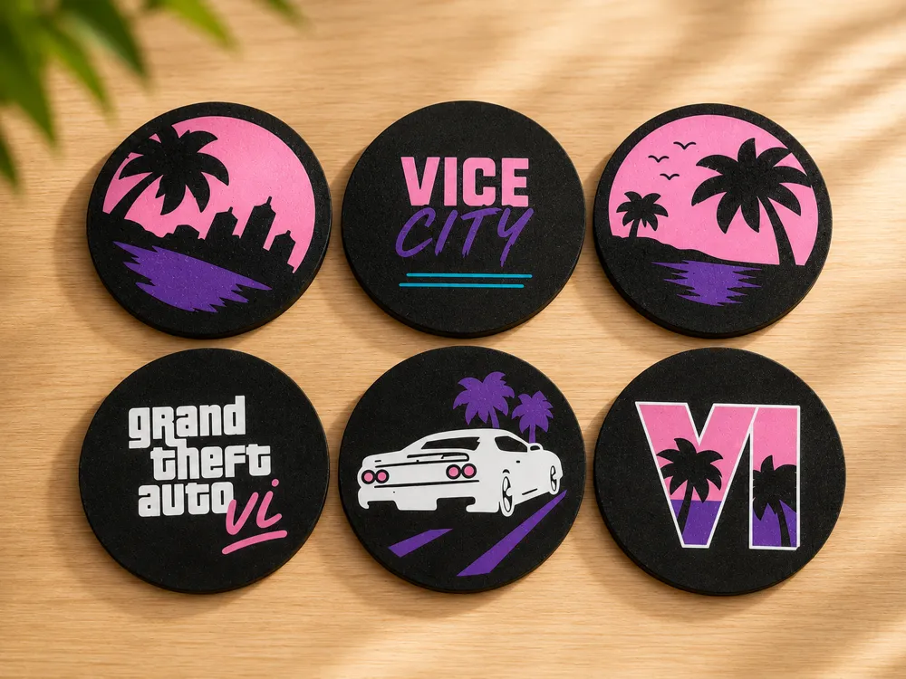 Six round Vice City stickers with palms, a sports car and the GTA VI logo